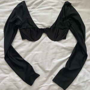 Going out black top with clasp back, size small